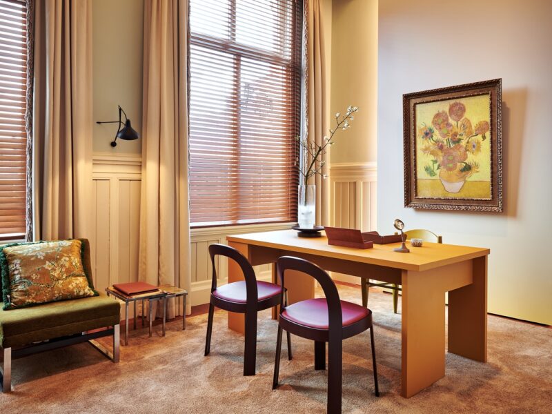 Van Gogh Museum Suite at De L’Europe Amsterdam, featuring artistic decor inspired by Vincent van Gogh’s works, including vibrant sunflower artwork