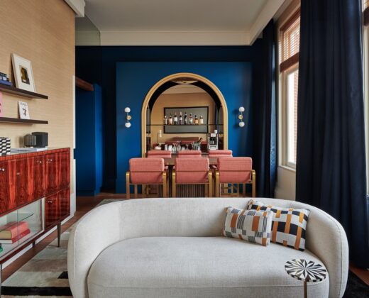 Interior of the WOLFI Pictures Suite at De L’Europe Amsterdam, showcasing stylish decor and comfortable furnishings