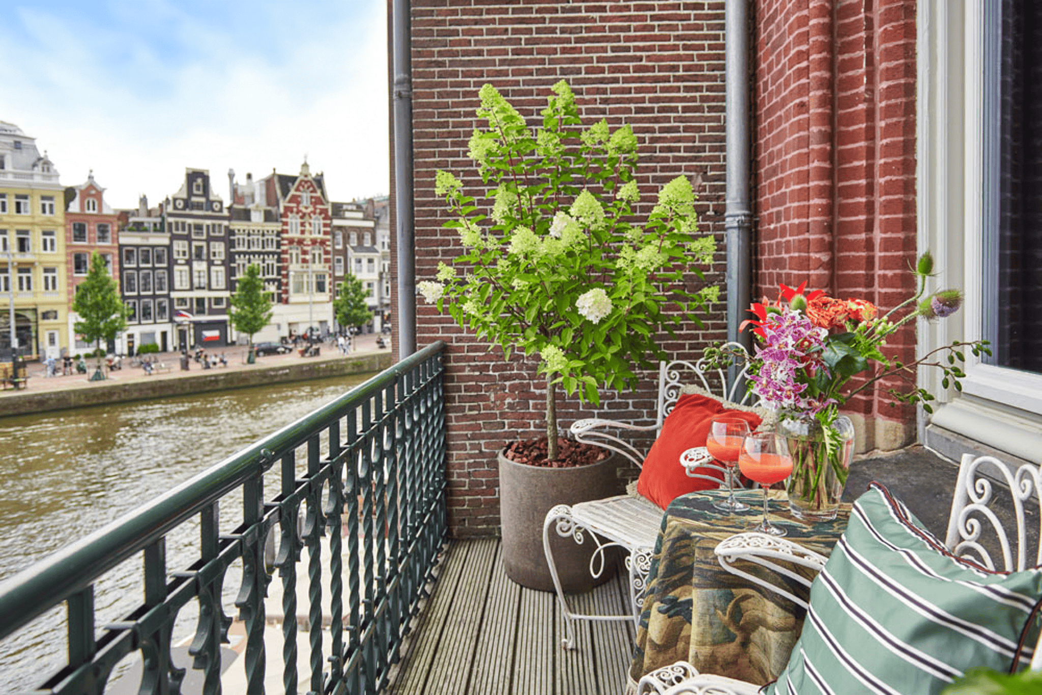Balcony with historical Amsterdam Houses in the Background
